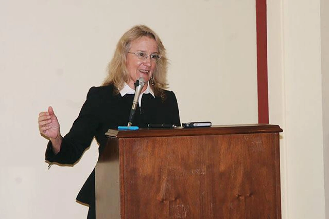 Carol A. Barnes, Ph.D. behind the podium