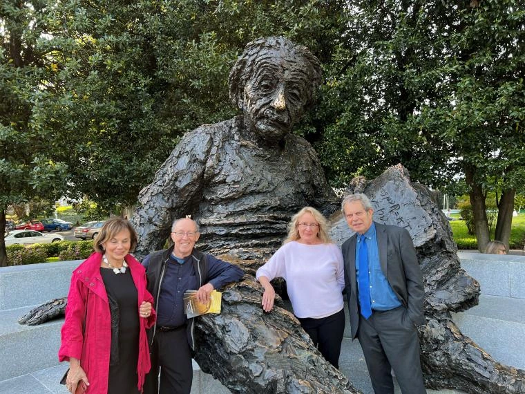 From right to left - Richard Morris, Carol Barnes, and Lynn Nadel in front of the Einstein Memorial Sculpture (installed in 1979) at the 159th meeting of the National Academy of Sciences